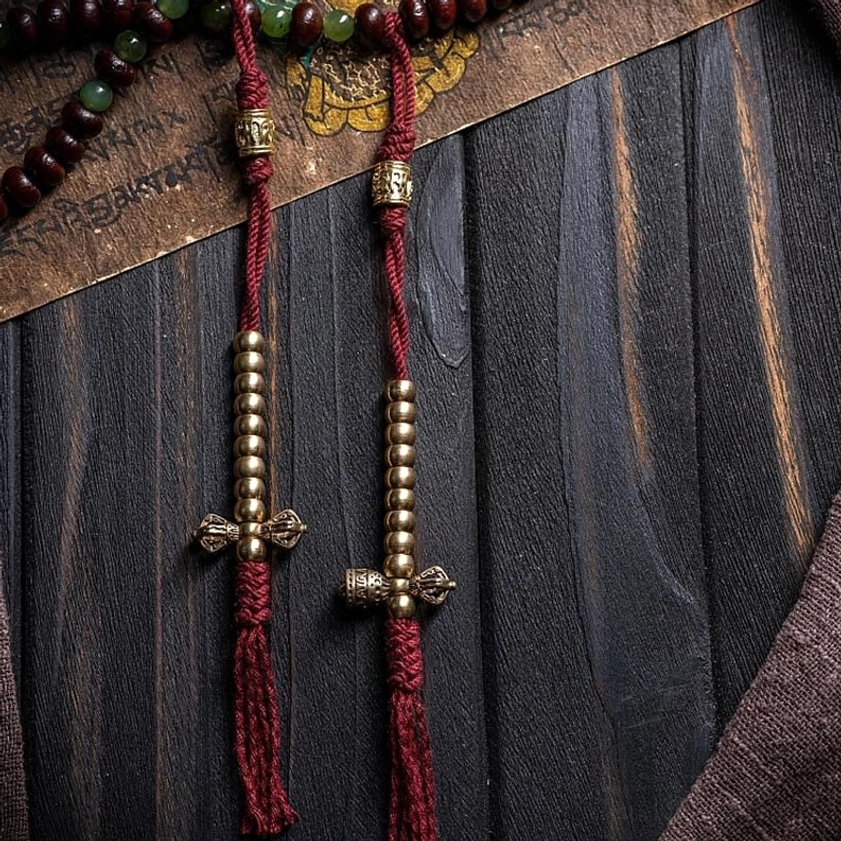 Buddhist prayer mala beads collection showing various bead sizes and material combinations