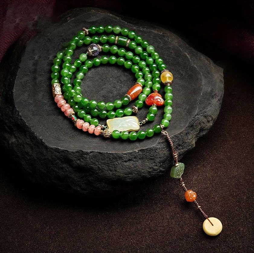 Buddhist prayer mala with laughing Buddha head carving and jade agate components