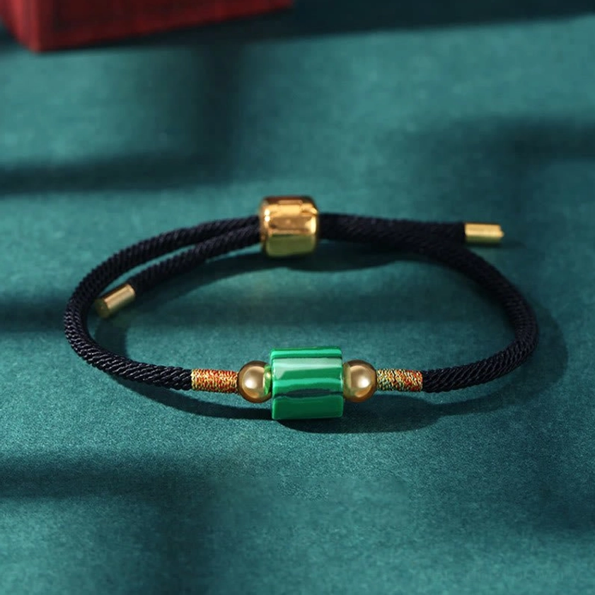 Black rope malachite Buddhist bracelet for spiritual transformation and protective energy with natural banded gemstone