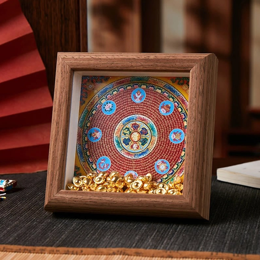 Buddhist mandala thangka photo frame with multicolored sacred geometry design and golden accents dark wood