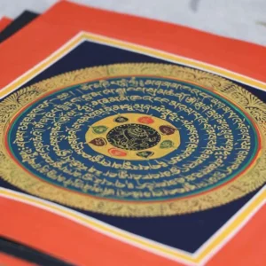 Hand-painted Buddhist mandala thangka scroll with gold Sanskrit text, red border, and dark blue base – sacred spiritual art for meditation and home altar décor