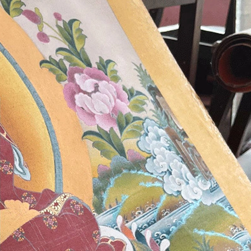 Buddhist mandala thangka painting featuring intricate spiritual symbolism and meditation focal point