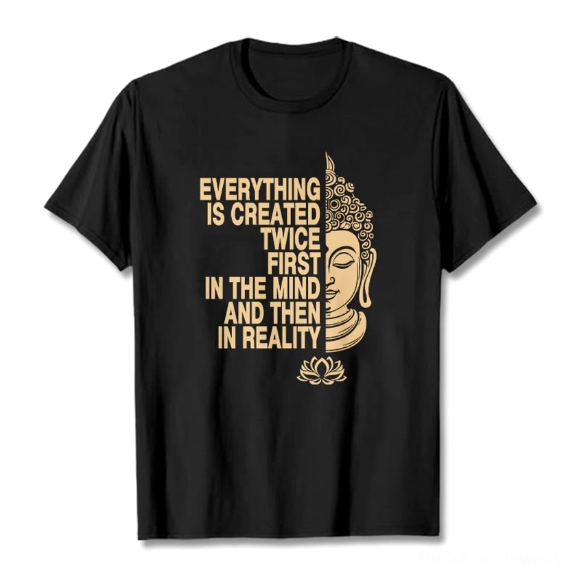 Black Buddhist manifestation t-shirt flat lay with gold Buddha head and lotus print on white background