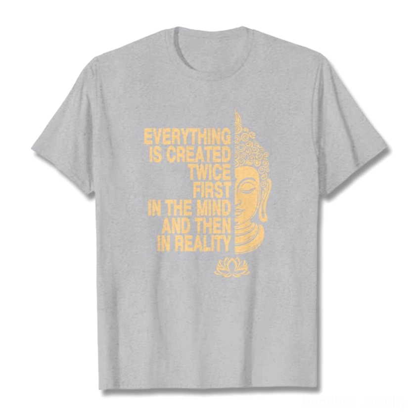 Light grey Buddhist graphic tee with gold printed spiritual design and manifestation philosophy