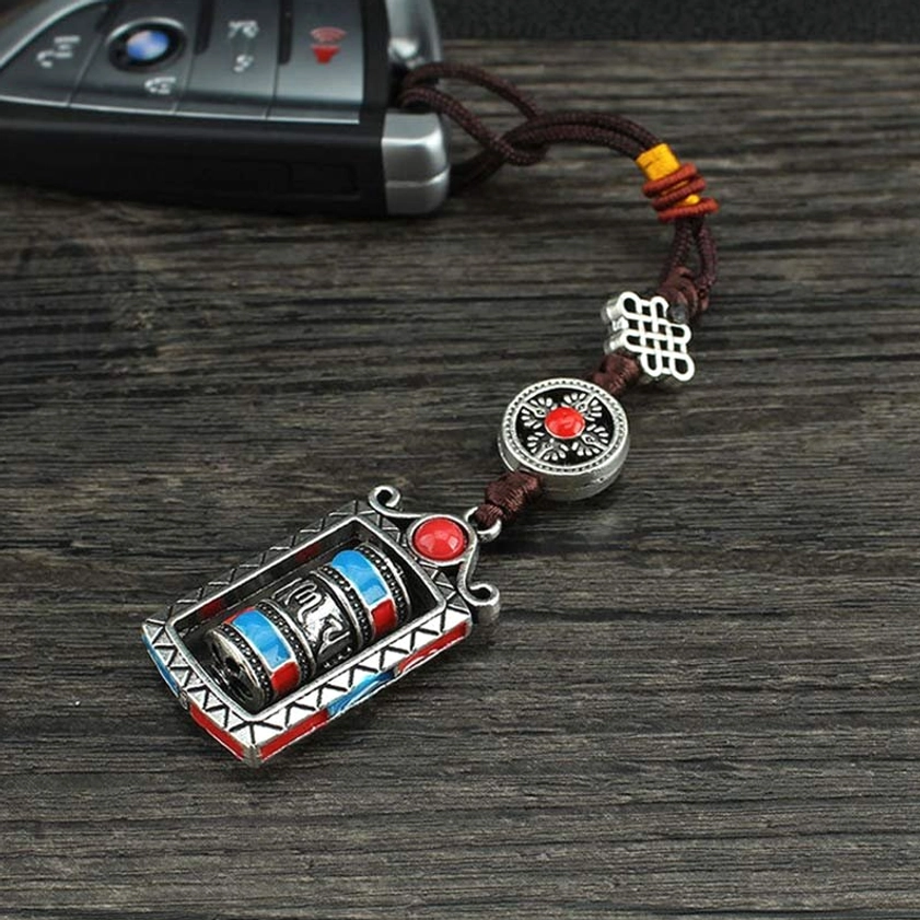 Buddhist mantra prayer wheel keychain companion for meditation yoga and wellness enthusiasts