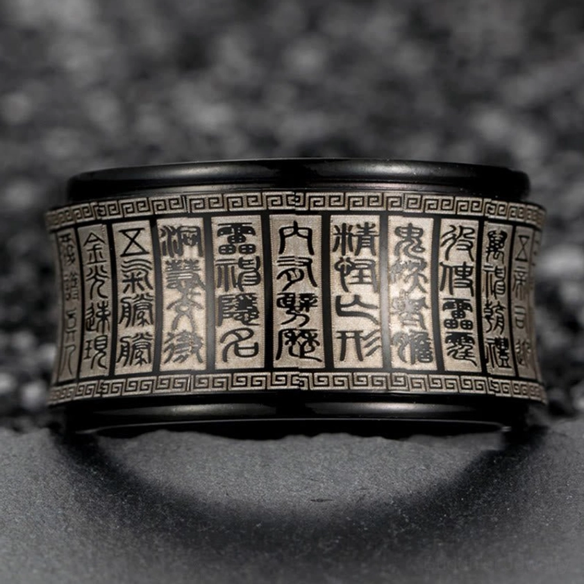 Buddhist mantra ring worn on finger showing comfort fit and golden finish