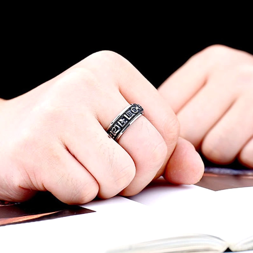 Buddhist mantra spinner ring as spiritual jewelry gift for meditation practitioners
