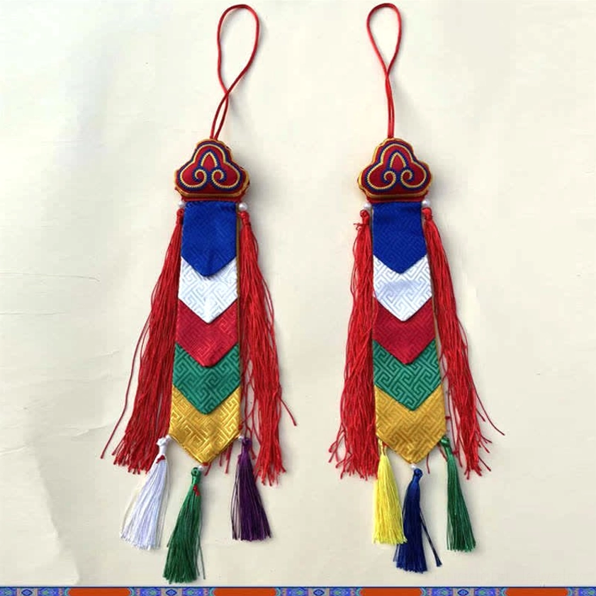 Pair of matching Buddhist silk tassel pendants with identical embroidered designs