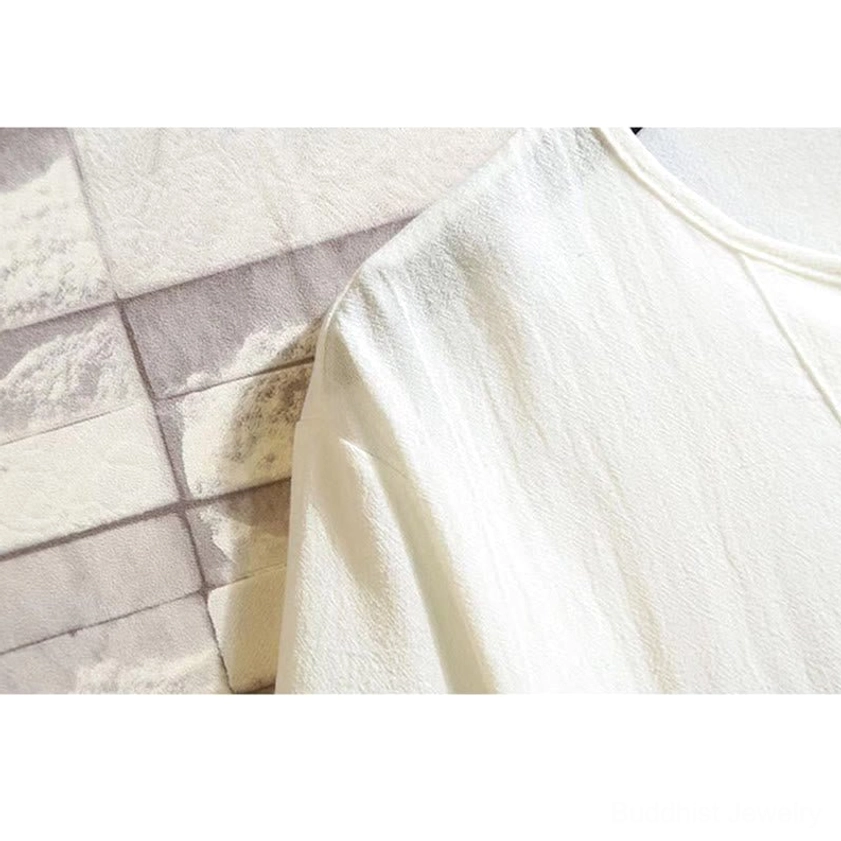 Cotton linen fabric texture close-up - natural sustainable material for Buddhist meditation wear