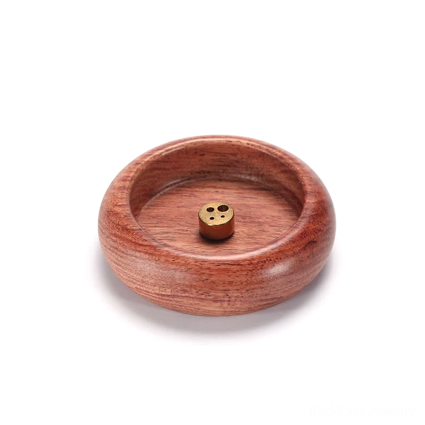 Handcrafted wood incense burner for Buddhist meditation and mindfulness practice, lifestyle shot