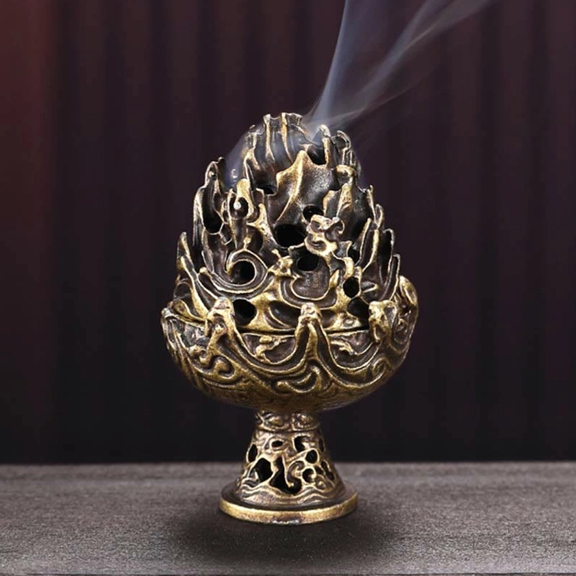 Buddhist meditation incense holder featuring sacred mountain relief iconography in antique bronze, mindfulness and wellness home accent