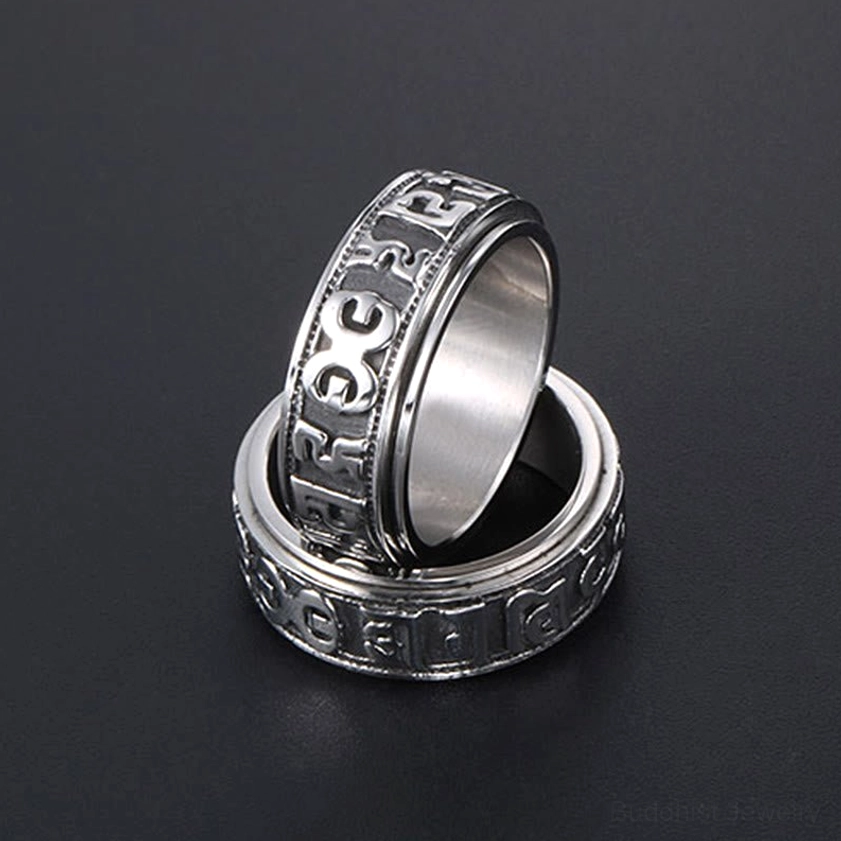 Buddhist meditation ring with spinning band for mindful fidgeting and spiritual practice