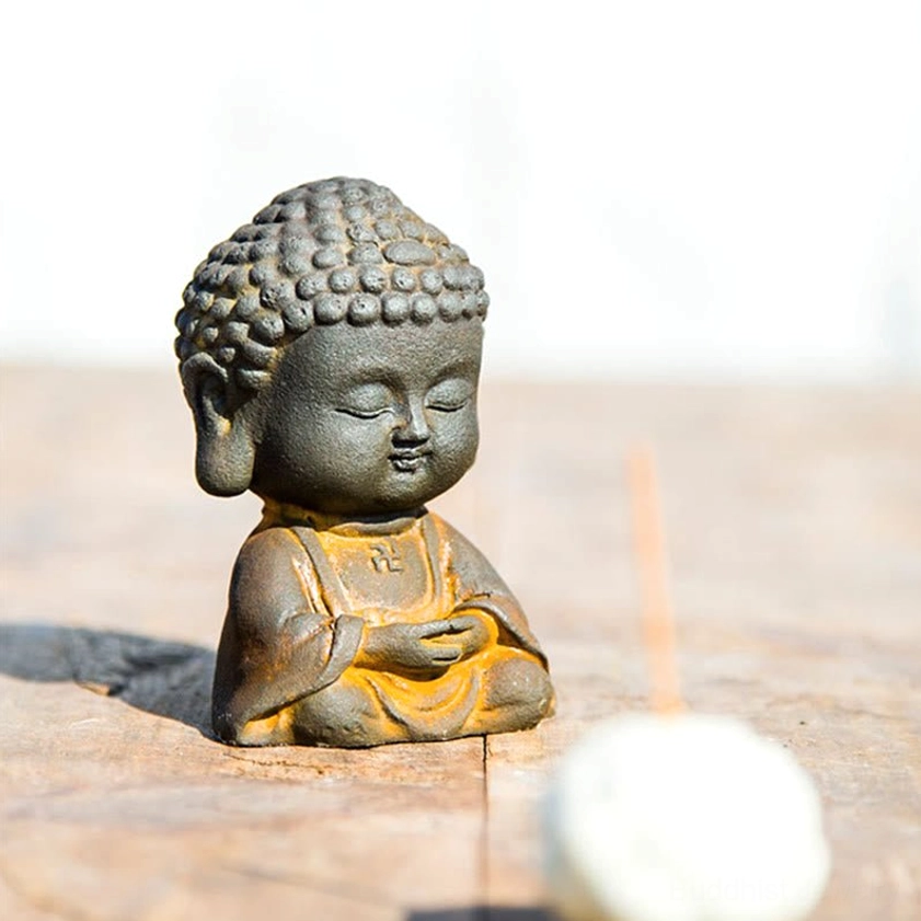 Buddhist meditation Buddha figurine showcasing traditional hand gesture and spiritual craftsmanship