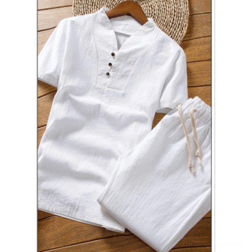 Buddhist henley shirt linen pants set flat lay oblique view drawstring waist buttons