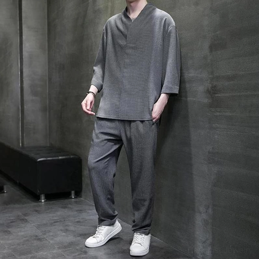 Buddhist casual mens set black three-quarter sleeve shirt black pants studio lighting display