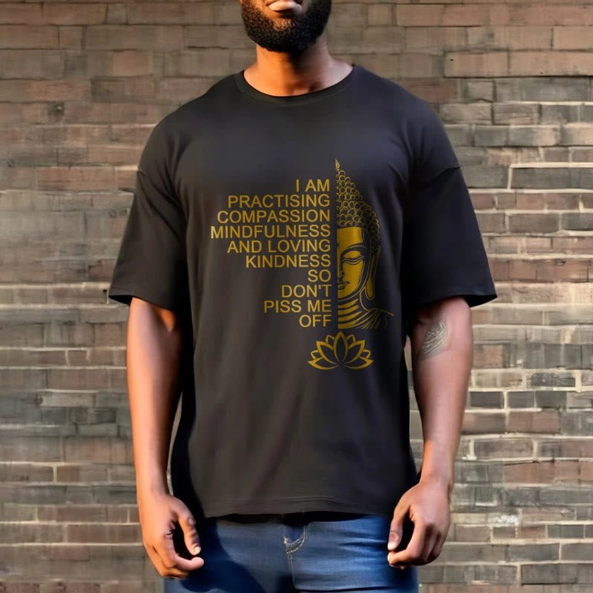 Men wearing black Buddhist mindfulness cotton tee with Buddha lotus print brick wall background