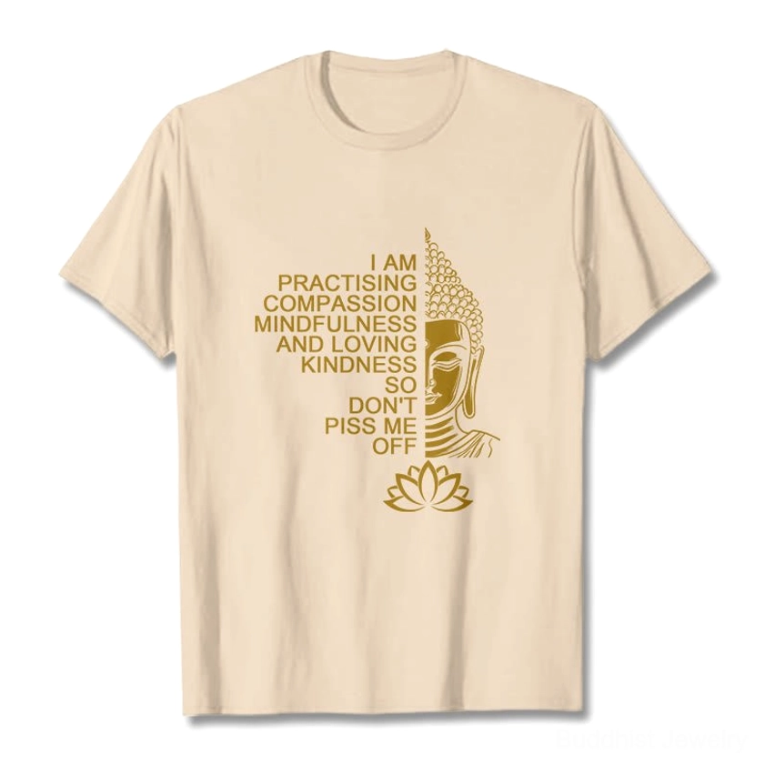 Buddhist mindfulness golden Buddha lotus flower cotton t-shirt flat lay light apricot beige color