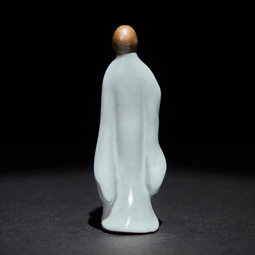 Ceramic Buddhist monk statue handcrafted with traditional glazing technique