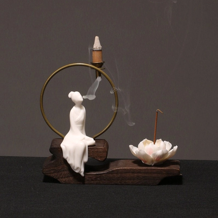 Back-facing white monk incense burner with faint incense smoke and lotus incense holder, peaceful Buddhist meditation piece