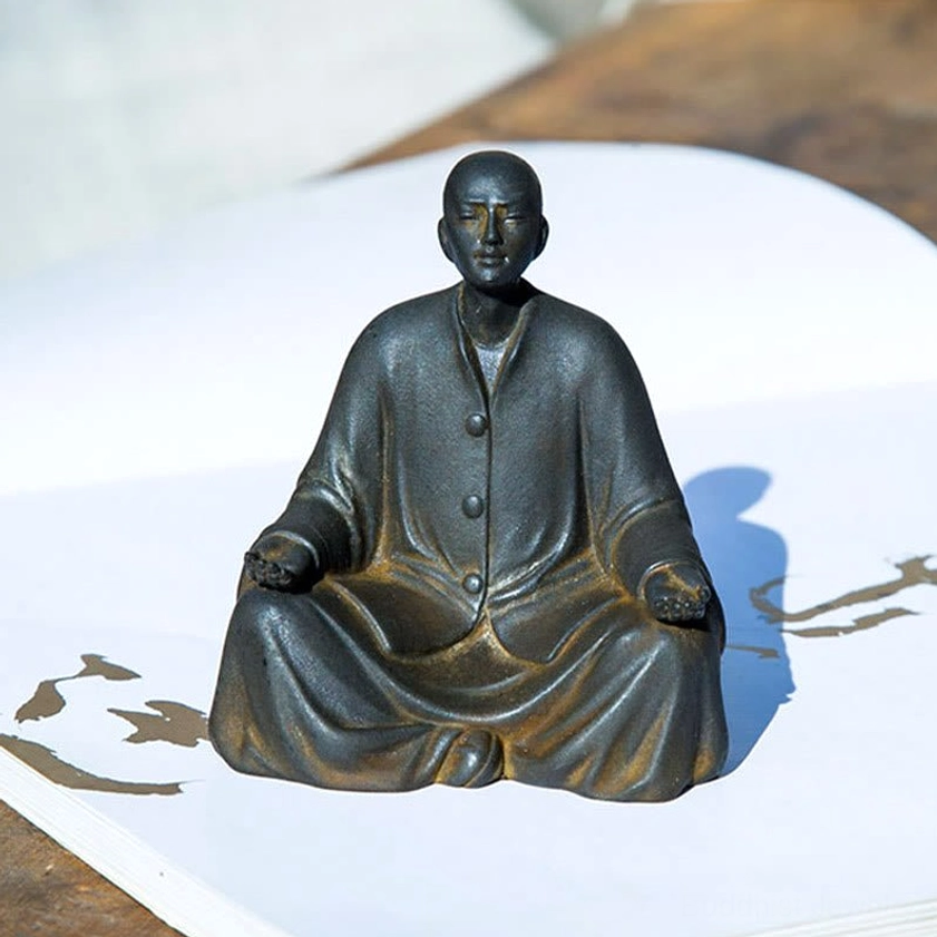 Buddhist Monk Prayer Statue with Golden Worn Texture - Handcrafted Meditation Statue on Textured Surface