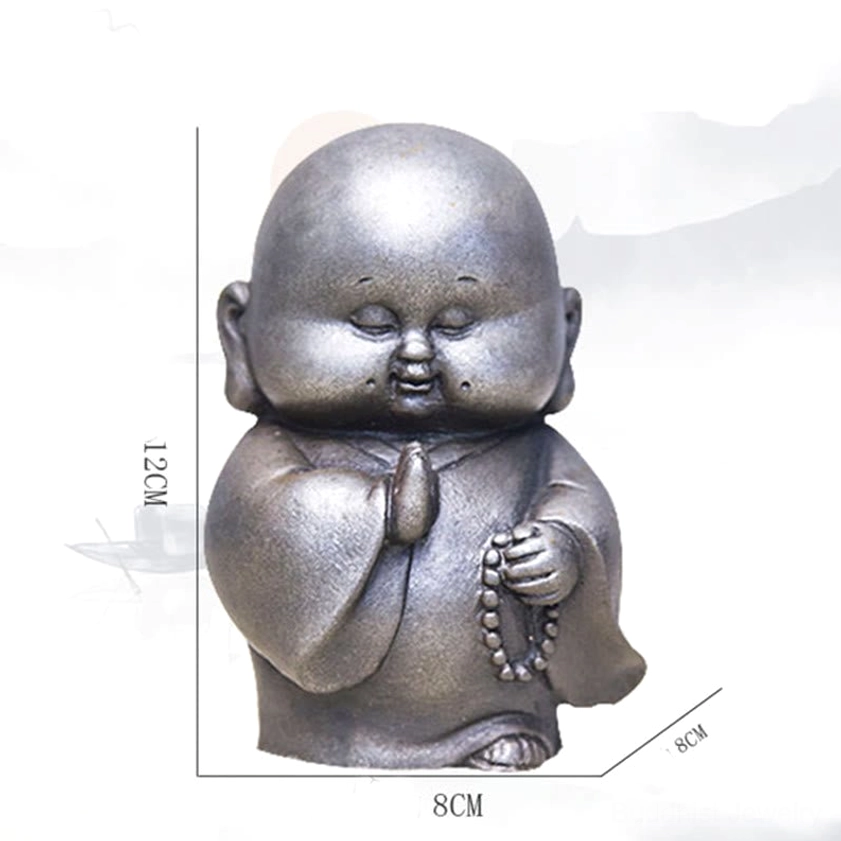 Buddhist monk ornament statue meditation pose captured in detail showing iron powder material quality