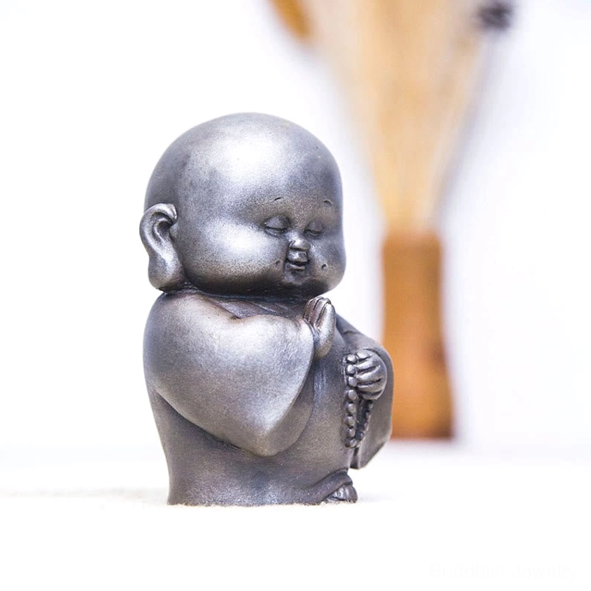 Buddhist monk iron powder resin statue polished version with smooth contemporary finish and timeless appeal