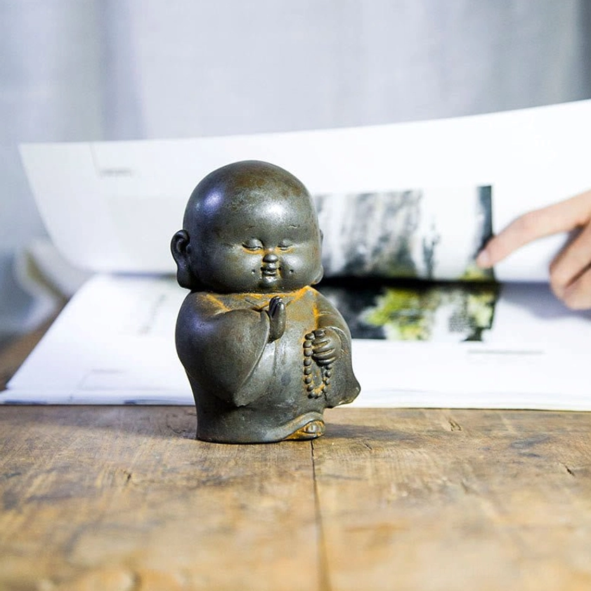 Buddhist monk statue polished version with smooth dark grey metallic finish, contemporary minimalist style
