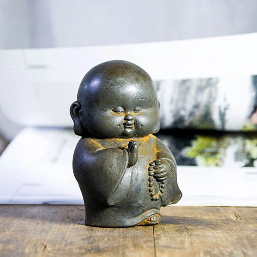 Buddhist monk meditation decoration close-up showing smooth matte texture and intricate prayer beads design