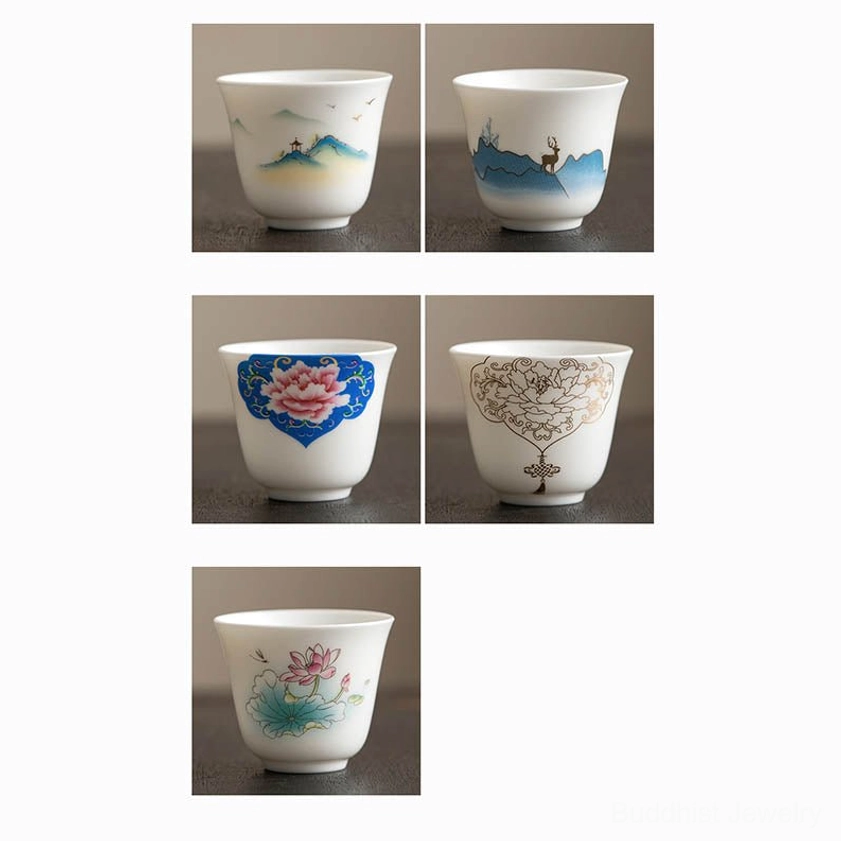 Buddhist handmade porcelain tea cup with intricate mountain landscape and pagoda artwork for contemplative tea rituals