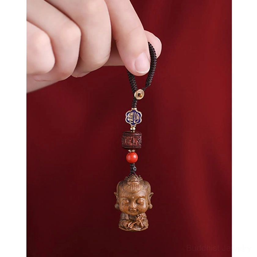 Full Buddhist natal buddha keychain vertical hanging arrangement with woven cord enamel and sandalwood pendant