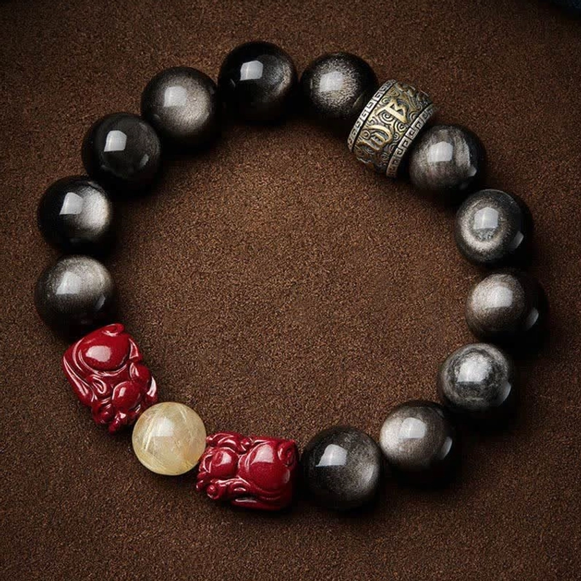 Handcrafted Buddhist jewelry featuring obsidian, red pixiu, and sacred mantra for spiritual practice