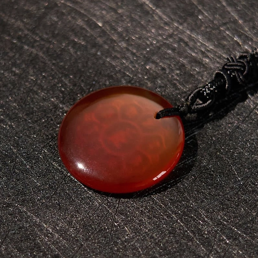 Buddhist Om Mani Padme Hum necklace pendant in various crystal colors displaying healing properties and spiritual significance