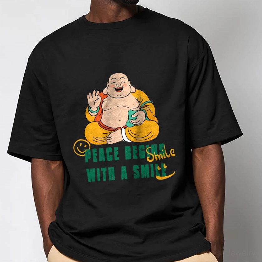Male model wearing black Buddhist mindfulness graphic tee loose fit indoor display