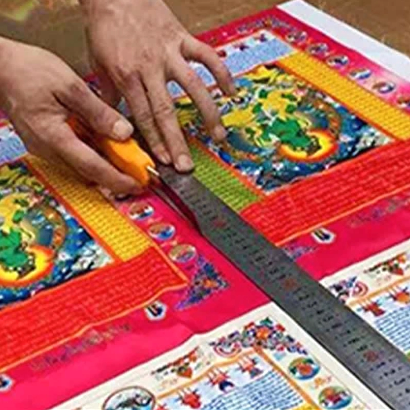 Prayer flag production hand-printed wooden block cutting printing process traditional craftsmanship
