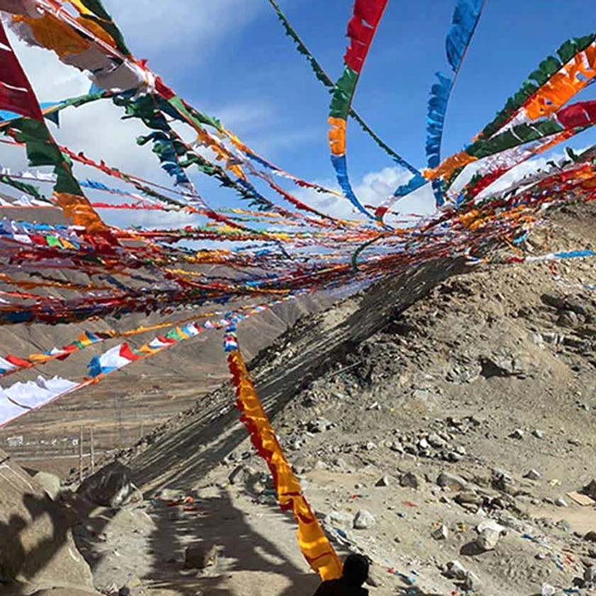 Buddhist prayer flags five elements harmony balance nature representation