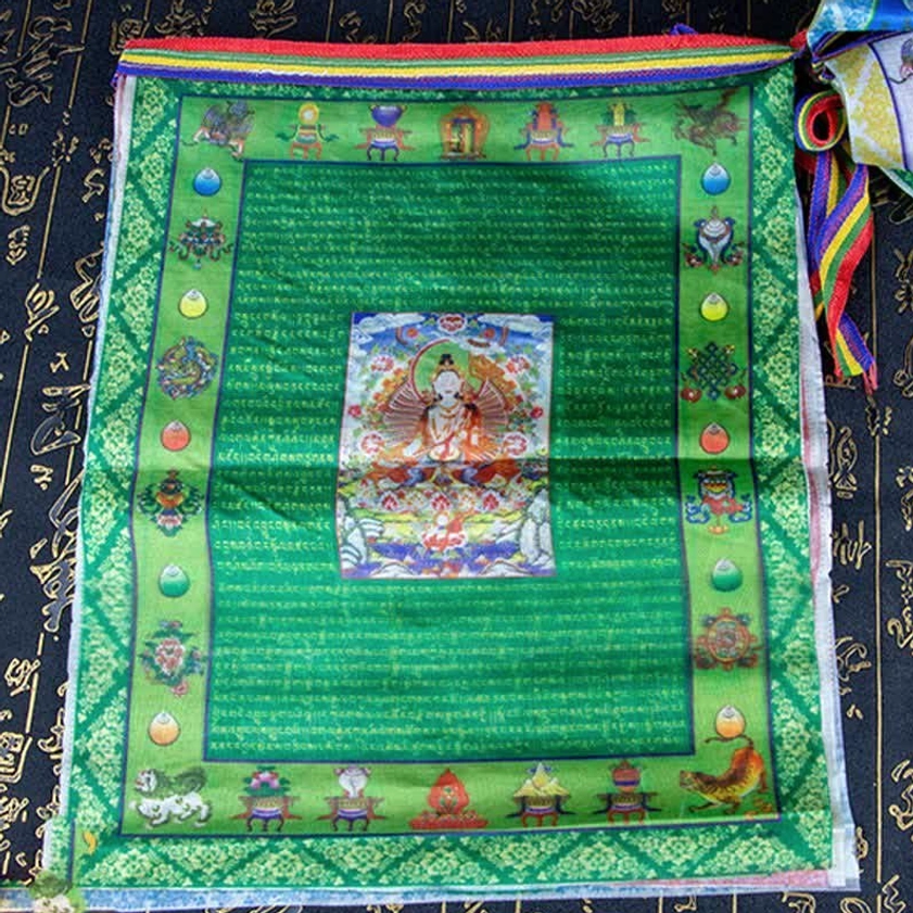 Authentic hand-printed Buddhist prayer flags with traditional wooden block techniques sacred mantras visible