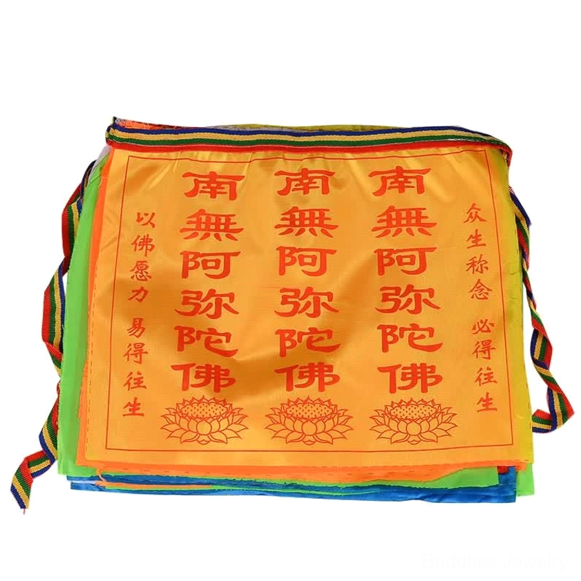 Buddhist prayer flags with colorful side ties and multi-layer design, studio flat lay showing orange flag and complete 21-piece set structure