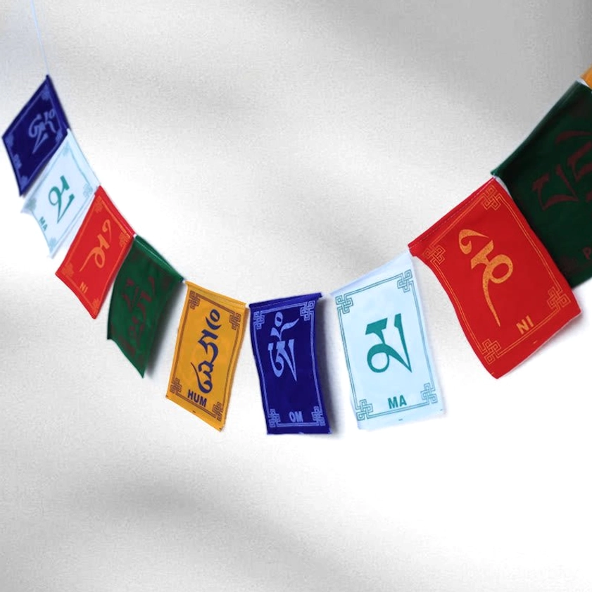 Handcrafted prayer flags with Om Mani Padme Hum mantra and sacred Buddhist prayers