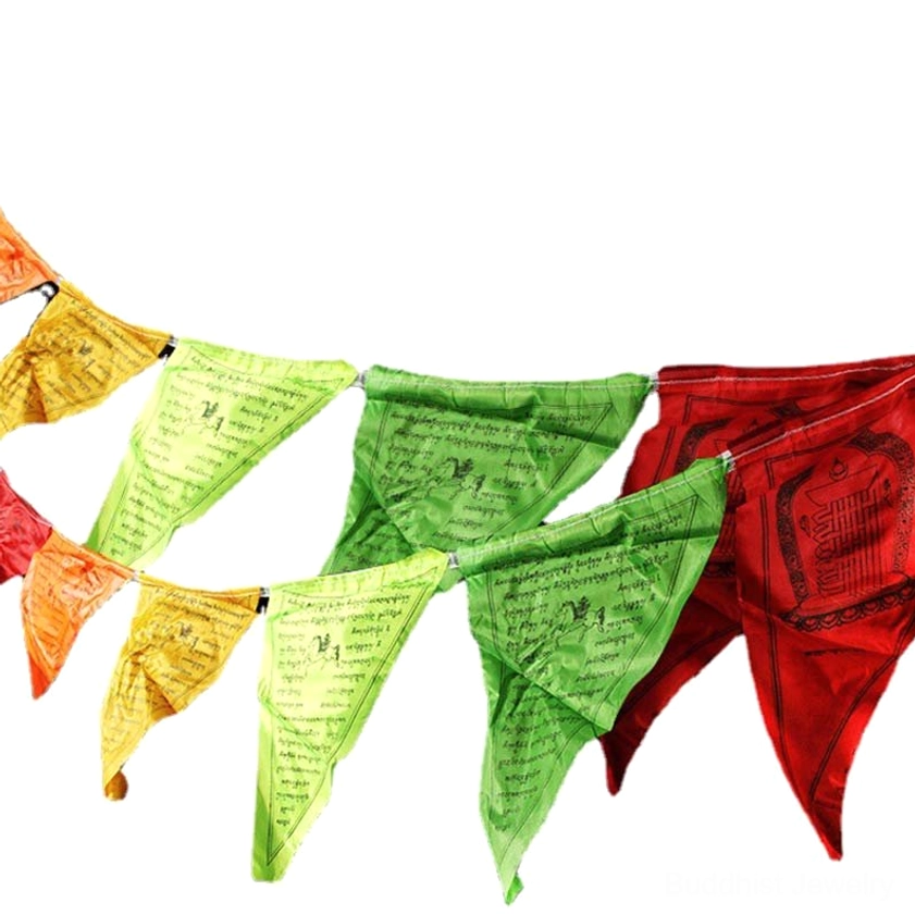 Buddhist prayer flags hanging in outdoor garden setting creating spiritual atmosphere and positive energy