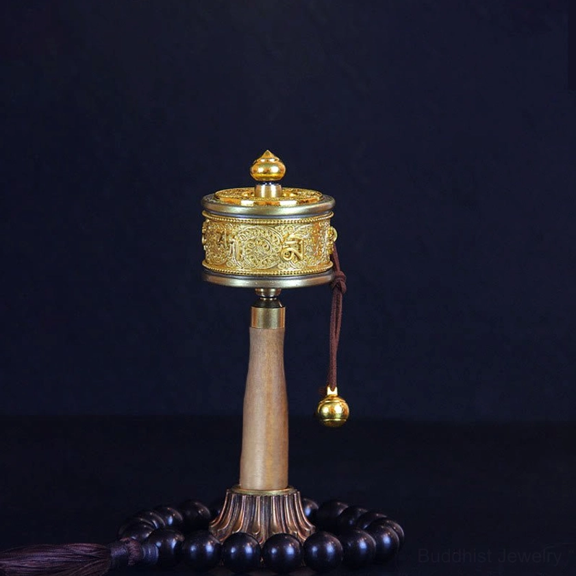 Authentic copper Buddhist prayer wheel with Om Mani Padme Hum mantra and brass bell, handheld design for meditation