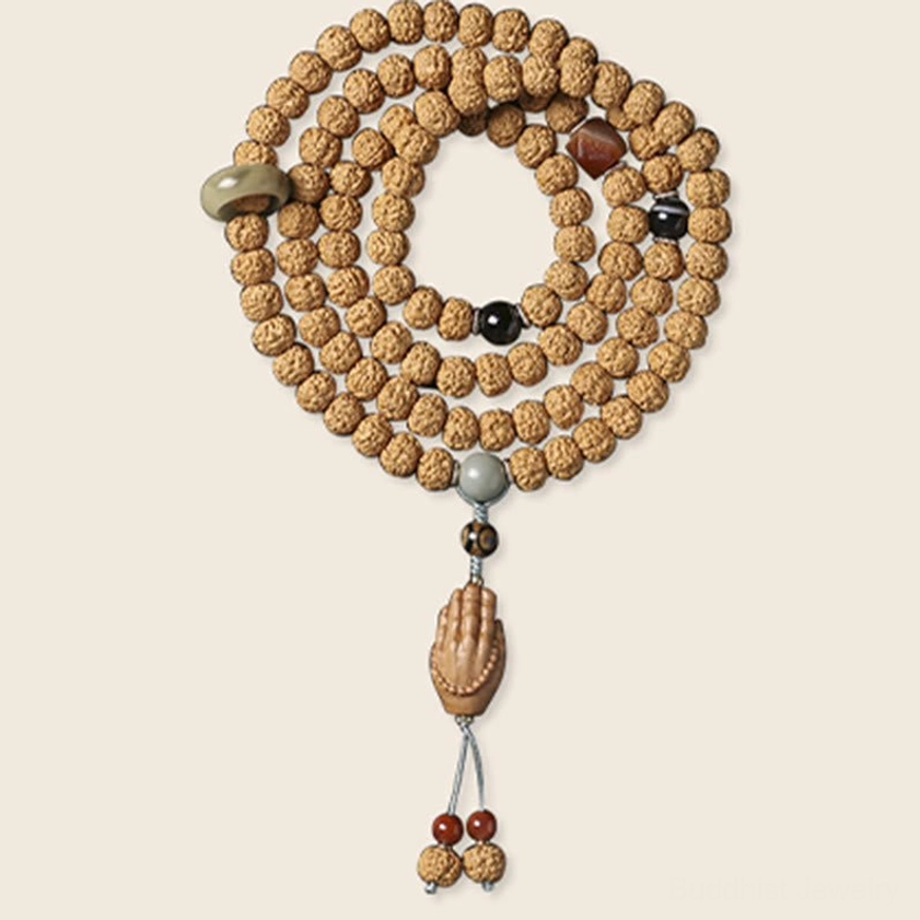 Buddhist prosperity bracelet with bodhi seeds, three-eye Dzi bead, and blessing Buddha hand pendant