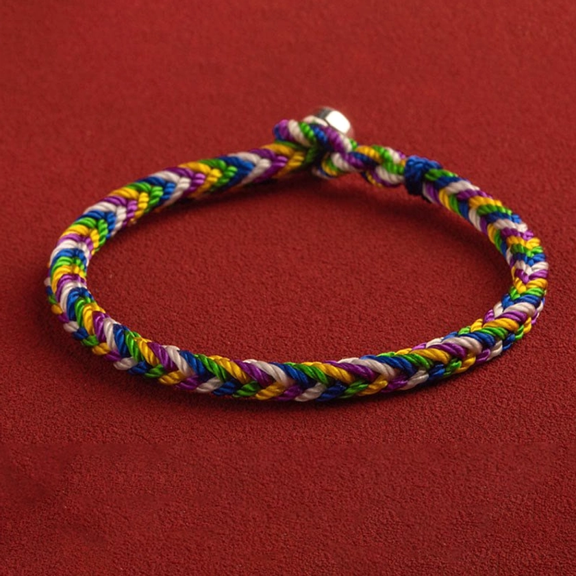 Multicolored Buddhist protection bracelet with protective knot design and silver metal hardware