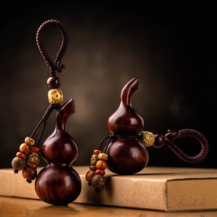 Sacred gourd Buddhist keychain showing protective symbolism, versatile styling option for spiritual practitioners and wellness enthusiasts