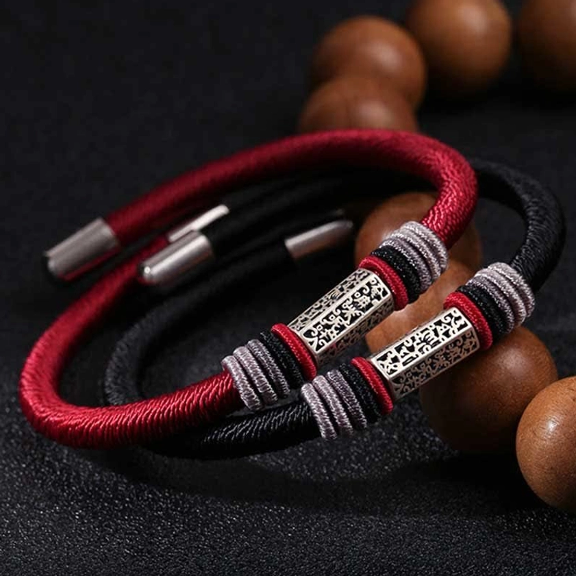 Buddhist red and black cord bracelets with matching engraved silver Om Mani Padme Hum pendants