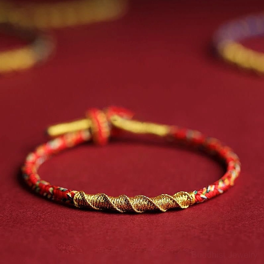 Red and gold handcrafted Buddhist red string bracelet with simple knot fastener and twisted cord weave
