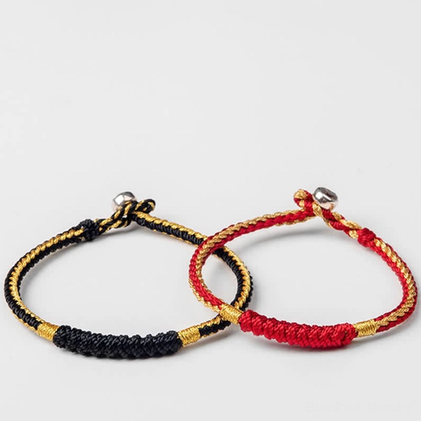 Handmade Buddhist red and gold braided string bracelet for protection, good luck, and spiritual intention setting