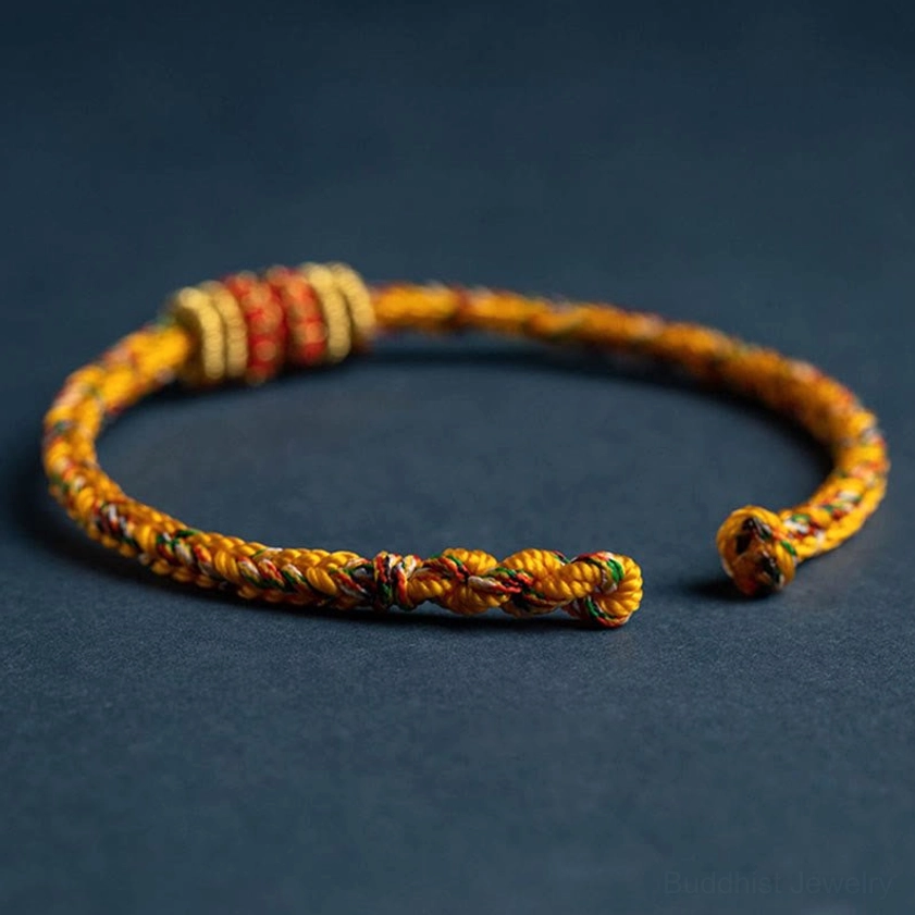 Handwoven buddhist red string bracelet for protection with authentic zodiac alignment