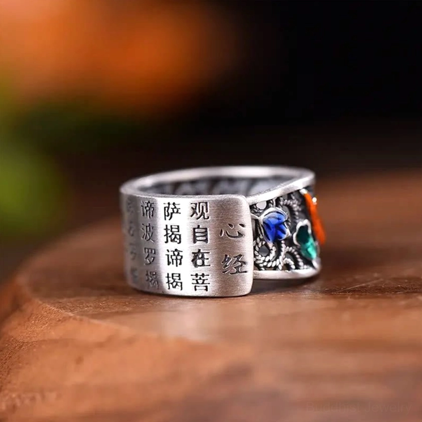 International Buddhist ring size guide and conversion chart showing US, UK, EU, and Asian sizing standards with finger measurement instructions