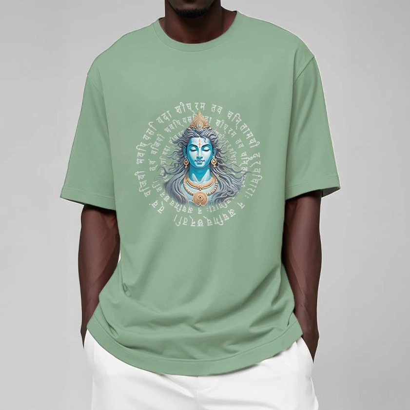 Woman in light grey Buddhist Sanskrit tee - front view showing comfortable unisex fit and spiritual imagery