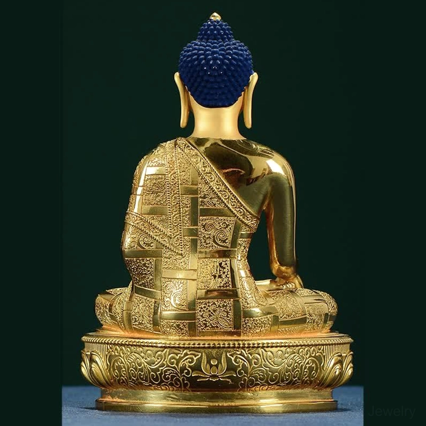Buddhist Shakyamuni copper offering statue with serene expression and robes